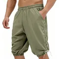 Detail view of men's olive green viking-style drawstring shorts with lace-up sides - S / Bottoms / Army Green