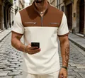 Detail view of men's color block waffle polo shirt with quarter zip and chest zippers. - S / Tops / Khaki
