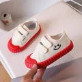 Soft-sole children's beige canvas shoes featuring red rippled soles and smiley face motif - Red