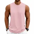 Close-up of pink sleeveless muscle tank top showing deep armholes and athletic fit - Apricot