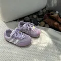 Detailed view of lavender mesh baby walking shoes with cute flower accents and soft soles. - 22-25 (Min. 4 Pairs) / Purple