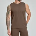 Men's athletic sleeveless tank top in brown for fitness and tennis training - Brown
