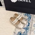 Elegante goudkleurige ballerina's voor meisjes met luxe parelbandjes en strikdetail. - 24 / Goud