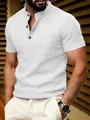 Close-up of a white waffle knit Henley shirt with a chest pocket and stand-up collar - White
