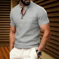 Detailed view of grey waffle-knit short-sleeve Henley shirt for men's summer casual wear - S / Tops / Gray