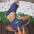 Detailed view of navy blue women wedge sandals featuring intricate laser-cut floral patterns - 36 / Laser Cut Style (610) / Navy Blue