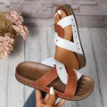 Chic women's cross-strap sandals featuring rivet accents in brown and white contrast - Brown White