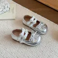 Sparkly silver girls princess shoes with lace flower pearl straps and sweet bow details - Silver
