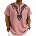Detail view of men's pink linen shirt with Celtic rune print around the V-neck - Pink