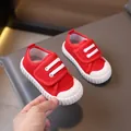 Comfortable red toddlers canvas shoes with soft soles and adjustable white Velcro straps. - Size 21 / Red Casual Style (22-1) / Inner Length 13.5cm / Red