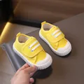 Bright yellow canvas toddler shoes with velcro straps and soft flexible white soles. - Size 21 / Yellow Casual Style (22-1) / Inner Length 13.5cm / Yellow