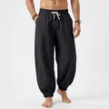 Close-up detail showing the texture and drawstring of men's black linen casual jogger pants - S / Bottoms / Black