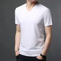 Close-up detail of a men's classic white V-neck short-sleeved T-shirt in thin fabric - S / Tops / White
