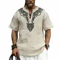 Detailed view of the Celtic knot pattern on a beige slub linen texture t-shirt - S / Tops / Apricot