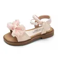 Stilvolle rosa Sommersandalen für Kleinkinder mit großer Schleife und Perlenbesatz - Rosa