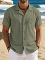 Close-up of men's olive green linen-blend short sleeve shirt at a beach setting - S / Tops / Pine Green