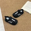 Detailed close-up of black and white breathable mesh children's sandals with closed-toe protection - 26-31 / 6 Pairs Pack / Black