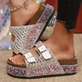 Detailed view of women's platform slides with colorful rhinestone beads and white double buckles - 43 / White
