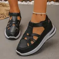 Detailed close-up of black hollow-out thick-sole sandals with velcro closure and sports style - 38 / Style 1 / Black