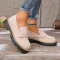 Close-up view of beige vintage platform loafers with chunky soles and ripped jeans - 36 / Off White