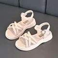 Elegant beige girls' summer sandals featuring cross-strap design and flexible soft soles - 26 / Beige