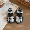 Elegant silver girls' princess sandals with black lace bows and metallic finish - 23 / Silver