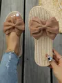 Summer casual flat slides featuring a large fabric bow knot and comfortable woven soles - 35 / Brown