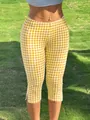 Detail of Y2K yellow gingham cropped pants featuring a stylish side slit design - S / Bottoms / Yellow Check