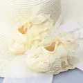 Cream yellow infant soft sole walking shoes with lace ruffles and rose ribbon details - Yellow