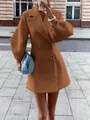 Detail view of a vintage style camel wool coat with large lapels and lantern sleeves - S / Tops / Camel