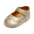Detail view of gold metallic baby princess shoes with scallop trim and velcro strap - Princess Shoes / 11cm / Gold