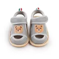 Close-up view of grey breathable mesh baby sandals with cute bear embroidery and soft soles - 11cm / Gray