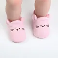 Detailed view of cute pink knitted baby walking shoes with embroidered cat face design - 13CM / Pink