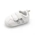 Detailed view of white breathable baby walker shoe with silver stripes and Velcro - White Silver