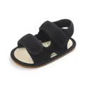 Detailansicht schwarzer Baby-Lauflernschuhe aus Mesh mit verstellbaren Klettverschlüssen. - Schwarz
