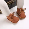 Soft brown suede baby walking boots featuring warm white faux fur lining and lace-up - Brown