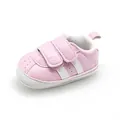 Detailed side view of pink baby pre-walker shoe with non-slip sole and velcro straps - Pink