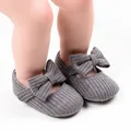 Detailed macro view of grey ribbed knit baby girl walking shoes with soft bow accents - 12cm / Bow Style / Gray