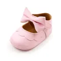 Detailed view of pink PU leather baby princess shoes with a large decorative bow. - Princess Shoes / 11cm / Pink