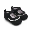 Detailed view of black infant princess walking shoes featuring white pom-poms and soft sole - Insole Length 11cm / Black