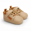 High-quality beige baby walking shoes with convenient velcro straps and Baby Boy label - 11cm / Apricot