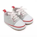 Adorable grey canvas baby girl walking shoes featuring pink ribbon bows and red trim details - 11cm / Gray