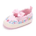 Roze geborduurde babyschoen voor meisjes met bloemmotieven en een schattige strik - Roze