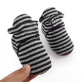 Detail of striped fleece-lined winter baby booties with soft anti-slip soles - 12cm (6-9Months) / Black