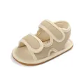 Detailansicht der beigen, atmungsaktiven Baby-Sandalen mit rutschfester Gummisohle. - Aprikose