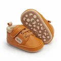 Detailed view of brown faux leather baby walker shoes with anti-slip footprint sole - 11cm (Size 1) / Brown