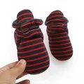 Detailed macro shot of infant winter boots featuring red and blue stripes and warm lining. - 13cm (9-12Months) / Blue Red