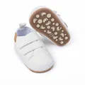 Close-up detail of white infant walking shoes showing non-slip sole and Velcro straps - 11cm / Casual Style (2150) / White