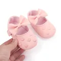 Detailed view of pink baby princess shoes with bowtie and heart pattern embroidery - 12CM/58g / Pink