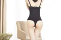 Guaina contenitiva a vita alta nera modello perizoma vista posteriore da donna - M/L / Pantaloni e gonne / Nero